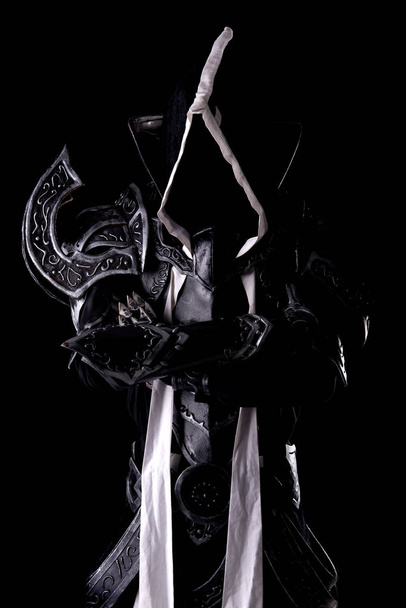man in underworld cosplay costume on black background  - Фото, зображення