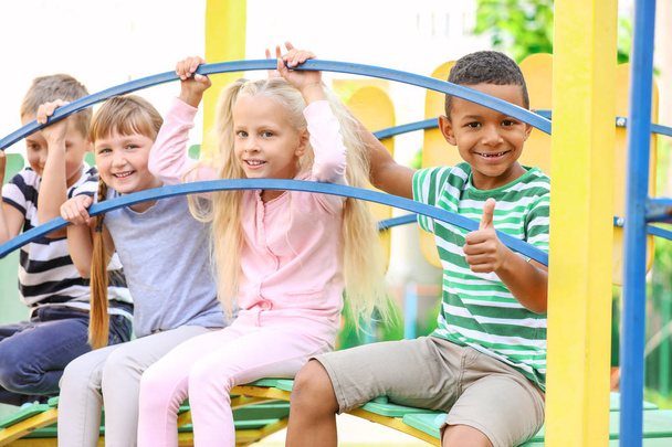 Cute little children on playground - Foto, Imagen