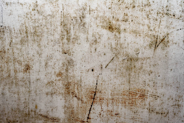 Metal texture with scratches and cracks which can be used as a background - Valokuva, kuva