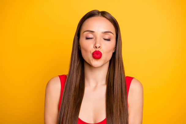 Close-up portrait of her she nice-looking attractive lovely sweet tender gentle posh straight-haired lady sending kiss closed eyes isolated over bright vivid shine yellow background - Fotoğraf, Görsel
