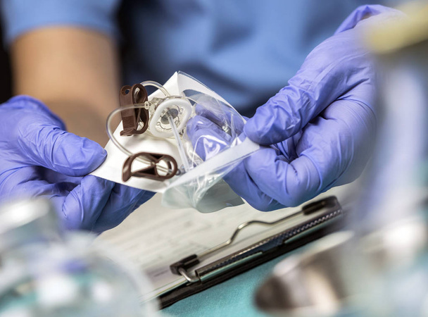 Nurse prepares Venous catheters of Long Duration in a hospital, Accessing Indwelling Central Venous Lines, conceptual image - Фото, изображение