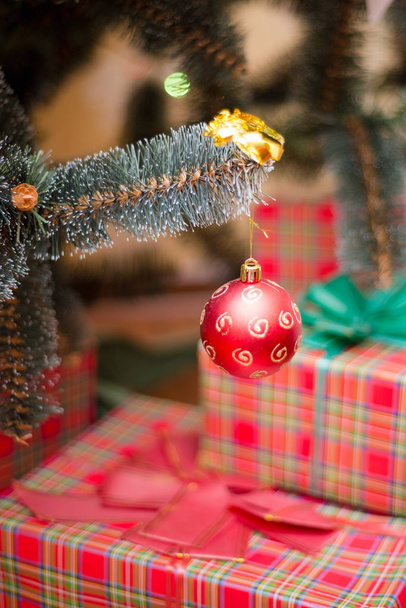 Christmas tree toys and gifts at Christmas tree - Valokuva, kuva