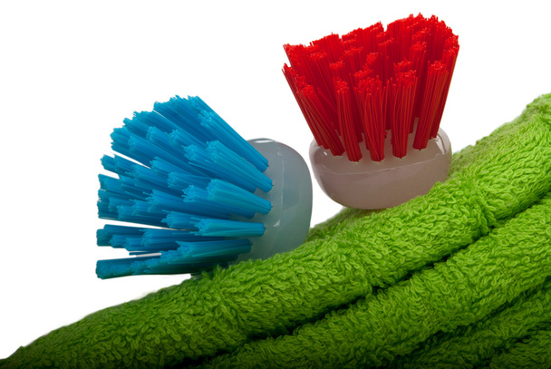 Brushes for ware washing lie on towel - Foto, Imagen