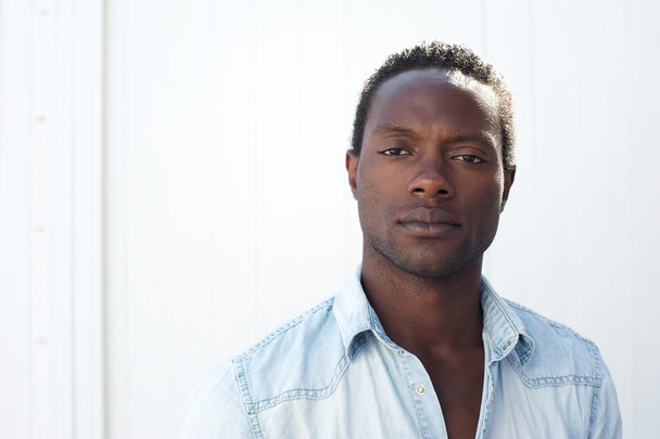 Portrait of a handsome black man against white background - Foto, Imagem