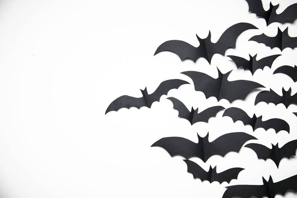 Halloween paper bat decorations on a white background. - Foto, Imagen