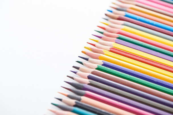 Selective focus of sharpened colored pencils on white - Foto, afbeelding