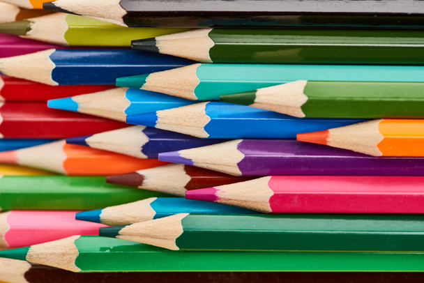 Bright color wooden pencils with sharpened ends - Fotoğraf, Görsel