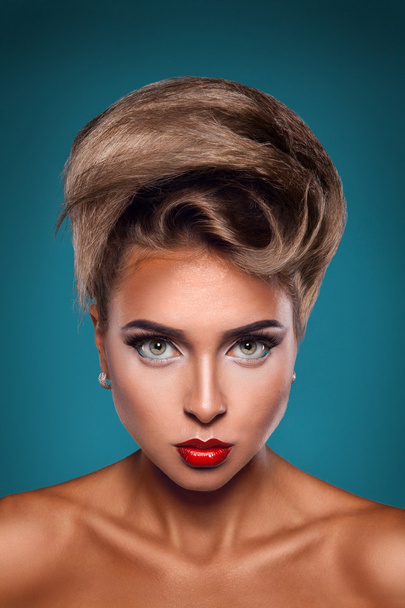 Vertical portrait of caucasian woman with unusuall hairstyle - 写真・画像