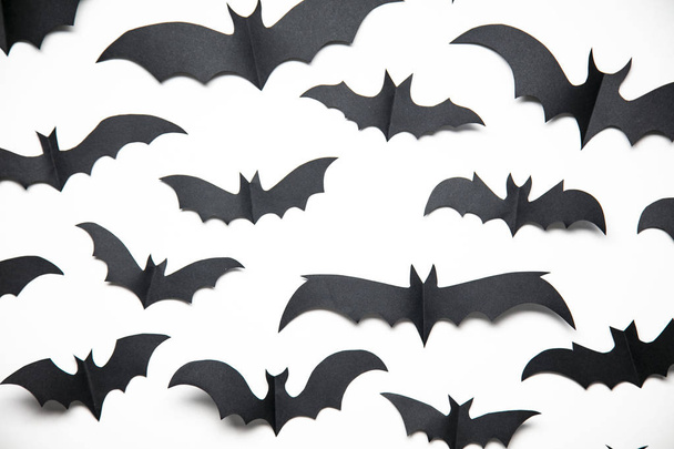Halloween paper bat decorations on a white background. - Φωτογραφία, εικόνα