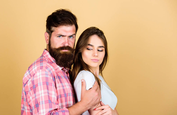 My couple. male and female fashion. valentines day. sexy woman and brutal guy with beard. passion couple. couple in love. bearded man hipster with girl. hairdresser and barber concept. copy space - Фото, изображение