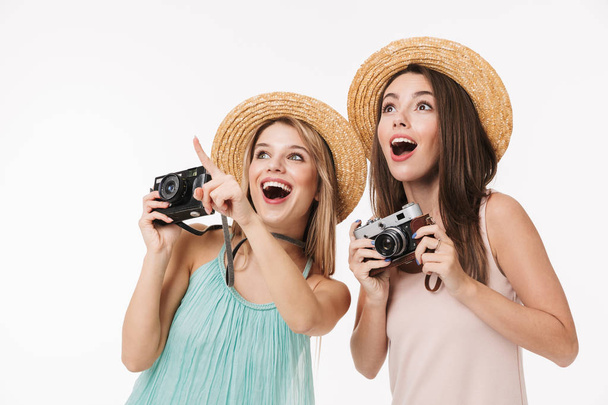 Two cheerful pretty young girls isolated - Φωτογραφία, εικόνα