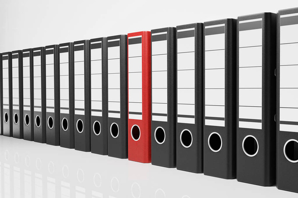 large row of black office folders with one red binder, conceptua - Photo, Image