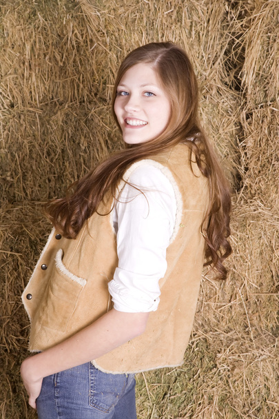 Woman by hay leaning back smling - Foto, Imagem