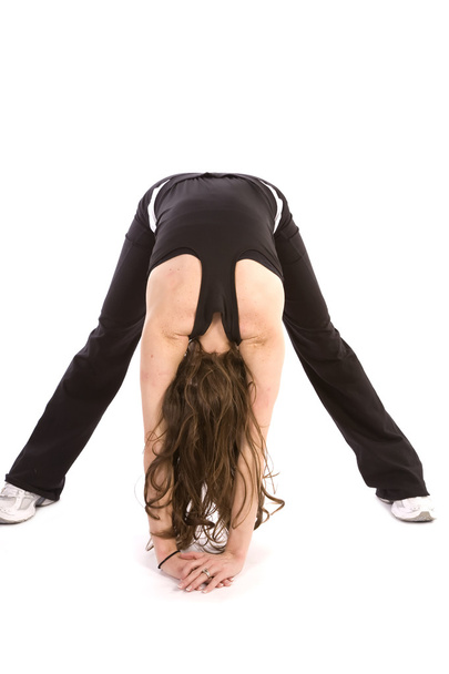Woman stretching out her back and legs - Photo, image