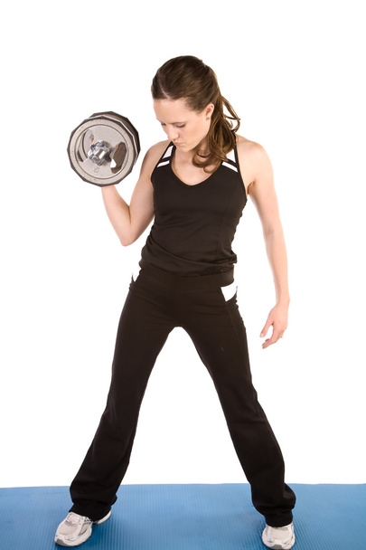 Woman lifting a weight - Zdjęcie, obraz