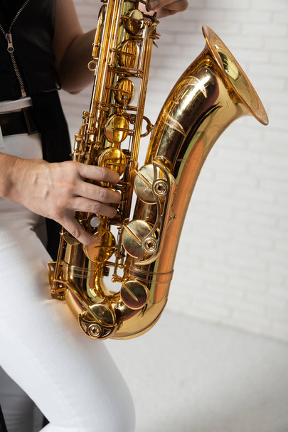 Musician plays the saxophone - Fotó, kép