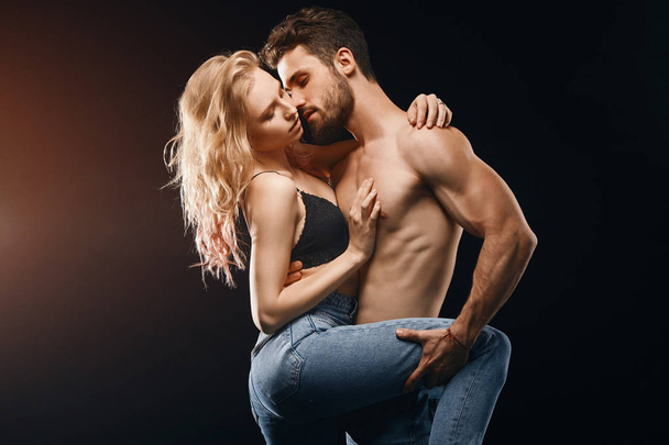 passionate man and woman having sex in the dark room - Photo, Image