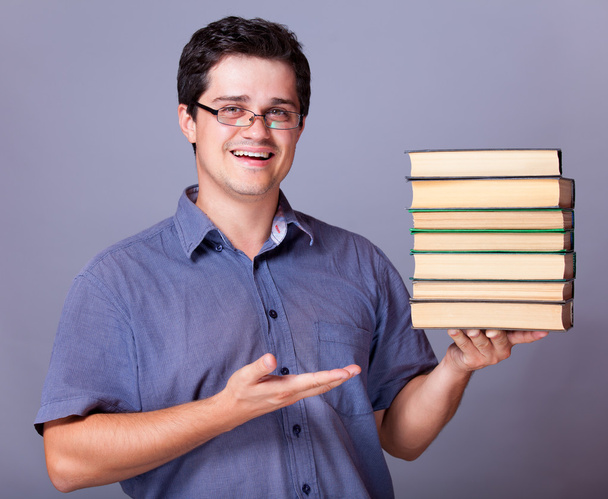 Man with books. - Foto, imagen
