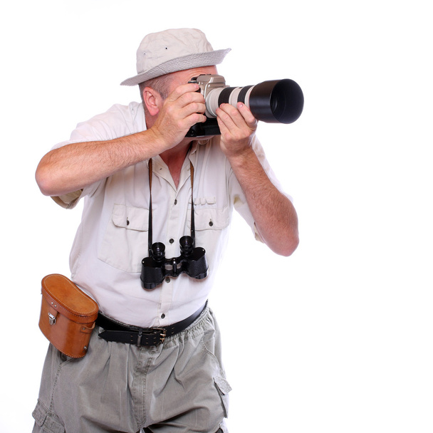 Photographer with cameras dressed on safari suit. Studio shot isolated on white - Fotografie, Obrázek