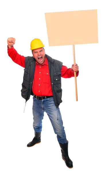 Злой протестующий рабочий с пустым знаком протеста
. - Фото, изображение