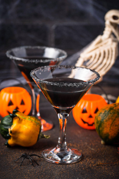 Halloweens spooky drink black martini cocktail - Photo, Image