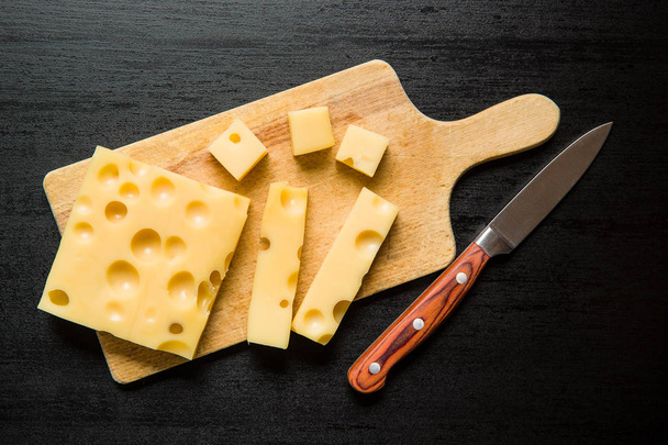 Block of tasty cheese. - Fotó, kép