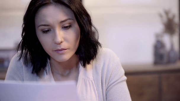selective focus of attractive woman holding papers  - Footage, Video