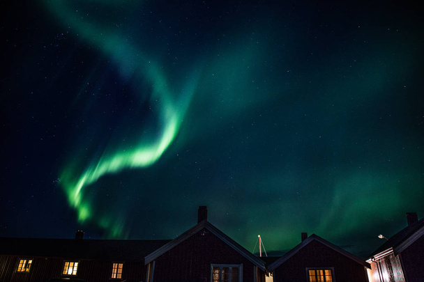 Northern lights above Reine in Lofoten islands in Norway - Photo, Image