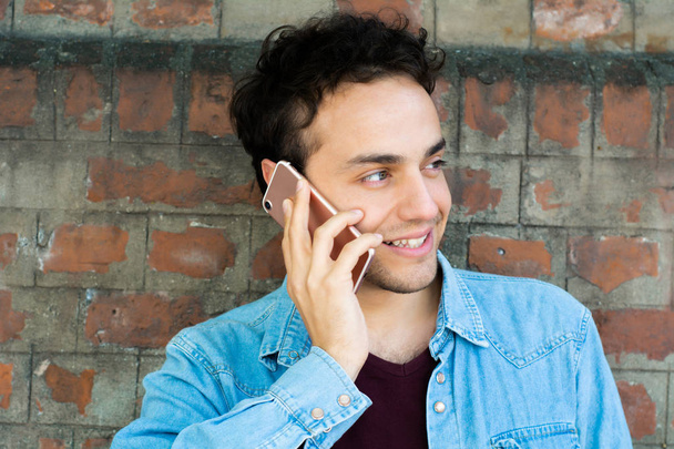 Latin man talking on the phone - Photo, Image