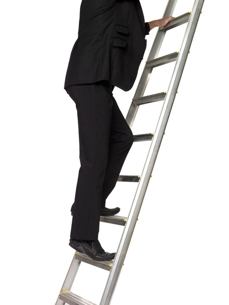 Man climbing a ladder - Photo, Image