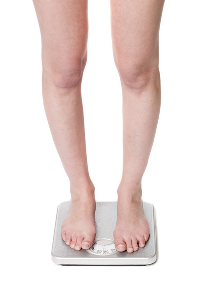 Standing on a weightscale - Foto, Imagem