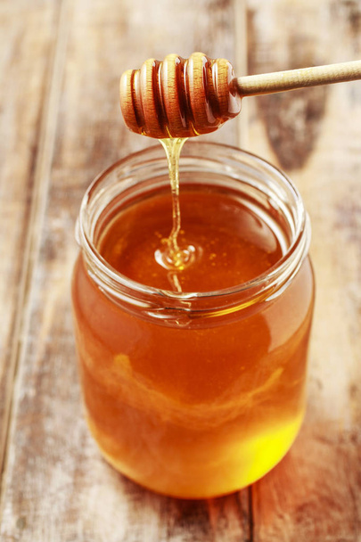 Jar of honey - Фото, зображення