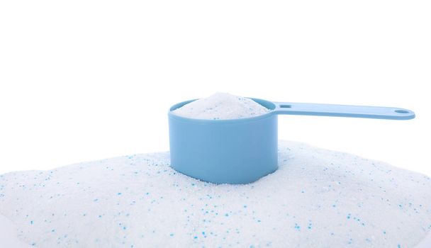 Measuring spoon with laundry powder on white background - Φωτογραφία, εικόνα