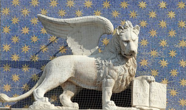 The symbol of Venice winged lion of St. Mark holding a book repr - Photo, Image