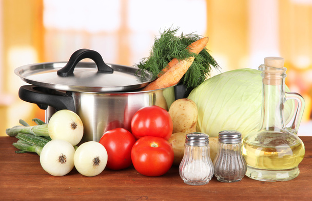 Ingredients for cooking soup on table in kitchen - Foto, Bild