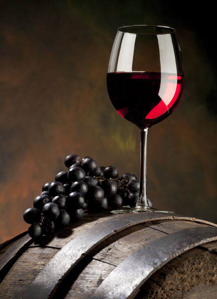 Still life with red wine and old barrel - Photo, Image
