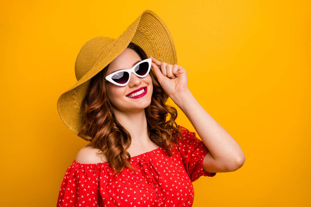 Pretty lady came pool party ready chill sun bathing wear red dress specs hat isolated yellow background - Foto, Bild