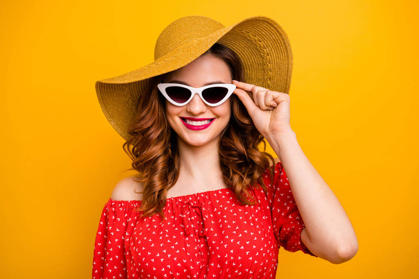 Pretty lady came pool party exotic resort ready chill wear red dress sun specs and hat isolated yellow background - Foto, afbeelding