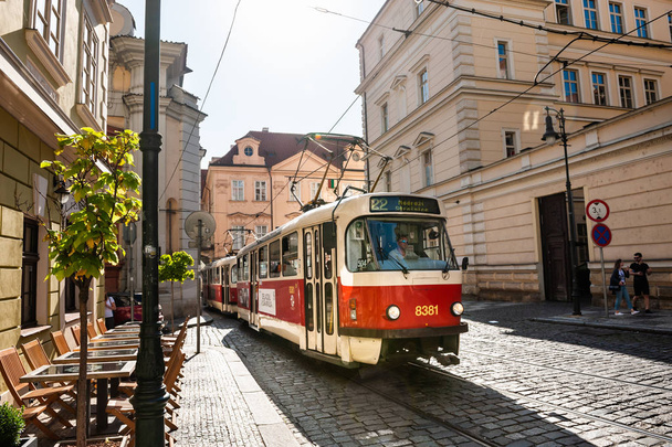 Retro tram driving on the street in Old Town of Prague - Foto, afbeelding