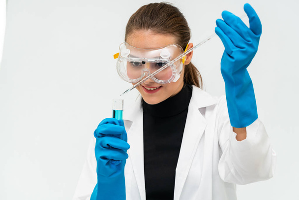 Woman scientist working in chemist laboratory. - Фото, изображение