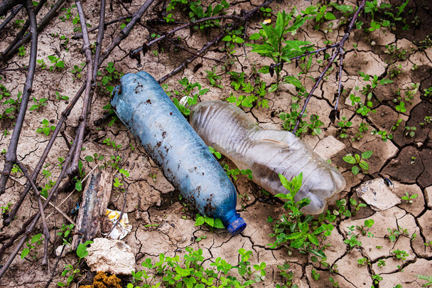 Plastic debris is lying on the ground. - Photo, Image