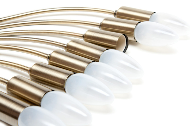 Electric light bulbs in golden patron - Zdjęcie, obraz