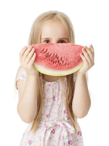 dívka v šatech jíst meloun - Fotografie, Obrázek
