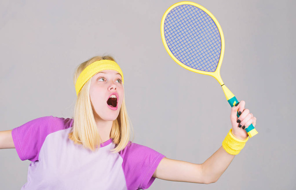 Sport for maintaining health. Active lifestyle. Woman hold tennis racket in hand. Tennis club concept. Tennis sport and entertainment. Active leisure and hobby. Girl fit slim blonde play tennis - Photo, Image