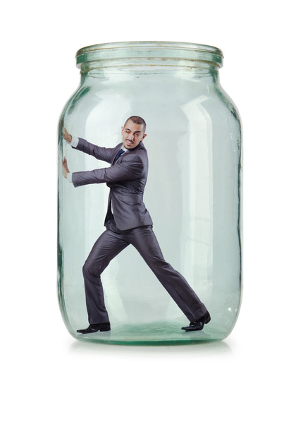 Молодий бізнесмен в скляній банці
 - Фото, зображення
