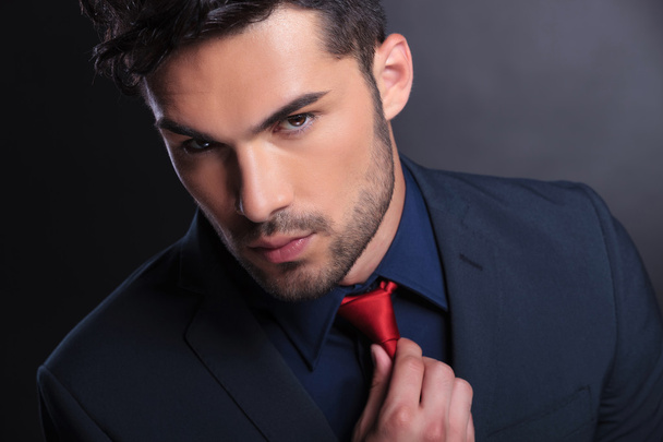 business man fixes his tie - Photo, Image