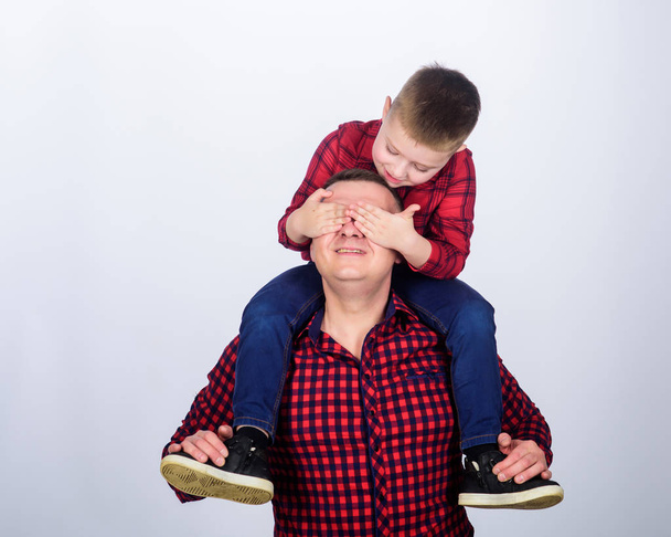 Having fun. Fathers day. Father example of noble human. Best friends forever. Father little son red shirts family look outfit. Dad piggybacking adorable child. Happiness being father of boy - Foto, Imagen
