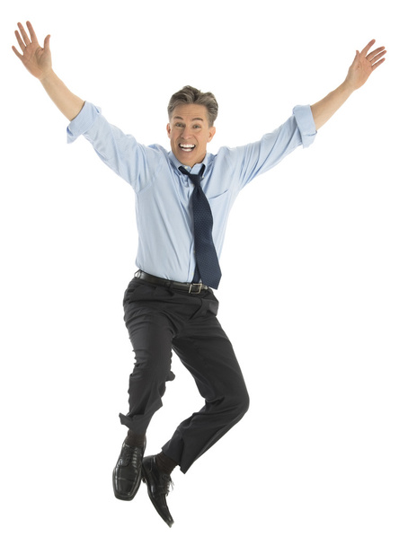 Portrait Of Successful Businessman Jumping In Joy - Foto, immagini