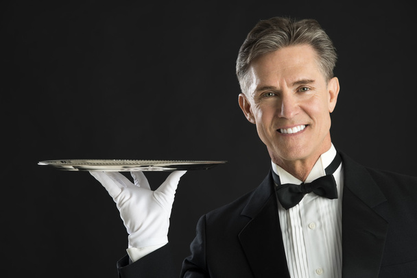 Happy Waiter In Tuxedo Carrying Serving Tray - Foto, Imagem