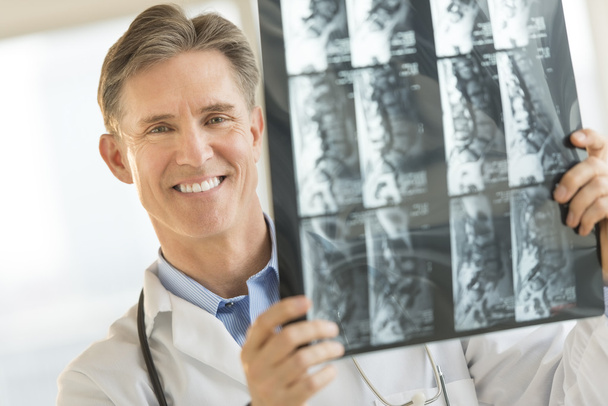 Confident Male Doctor With X-Ray Image - Φωτογραφία, εικόνα